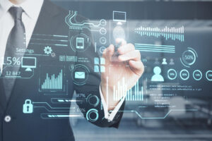 Businessman using a digital dashboard with automation, analytics, and IT process icons for business growth. 