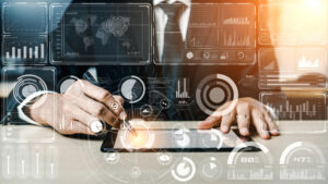 Hands typing on laptop with business automation and IT process icons overlay, symbolizing efficient workflow. 