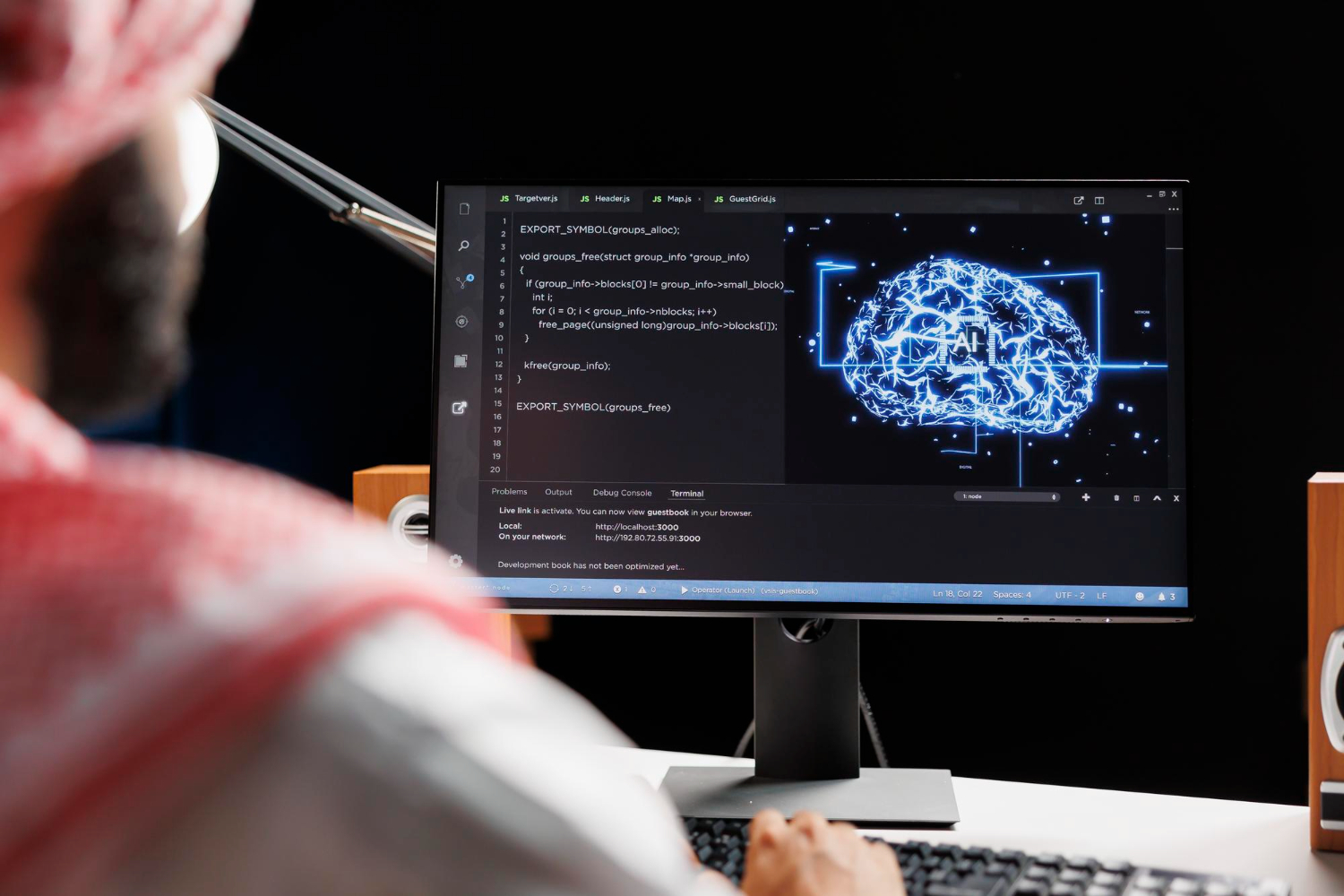 Person analyzing artificial intelligence and machine learning code for cloud resource optimization on a computer screen 